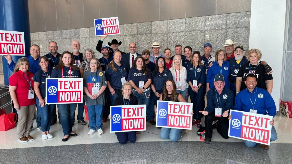 Texas Nationalist Movement supporters holding TEXIT signs